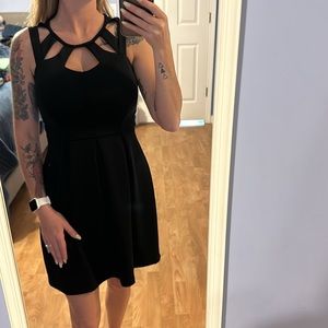 Black dress with cut out detail. Size Small